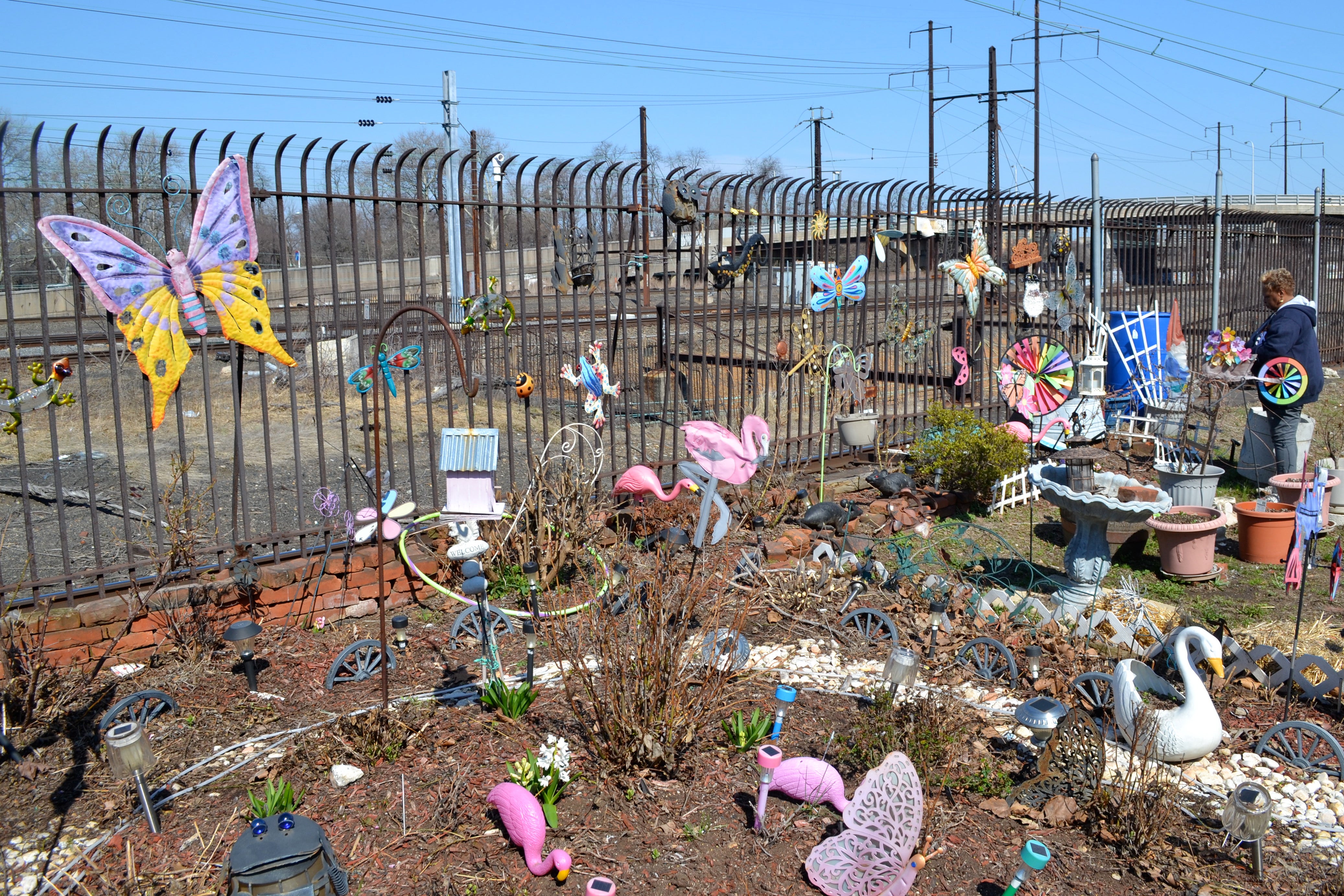 Even as it emerges from the winter, before plants have started to bloom, the garden is colorful and active