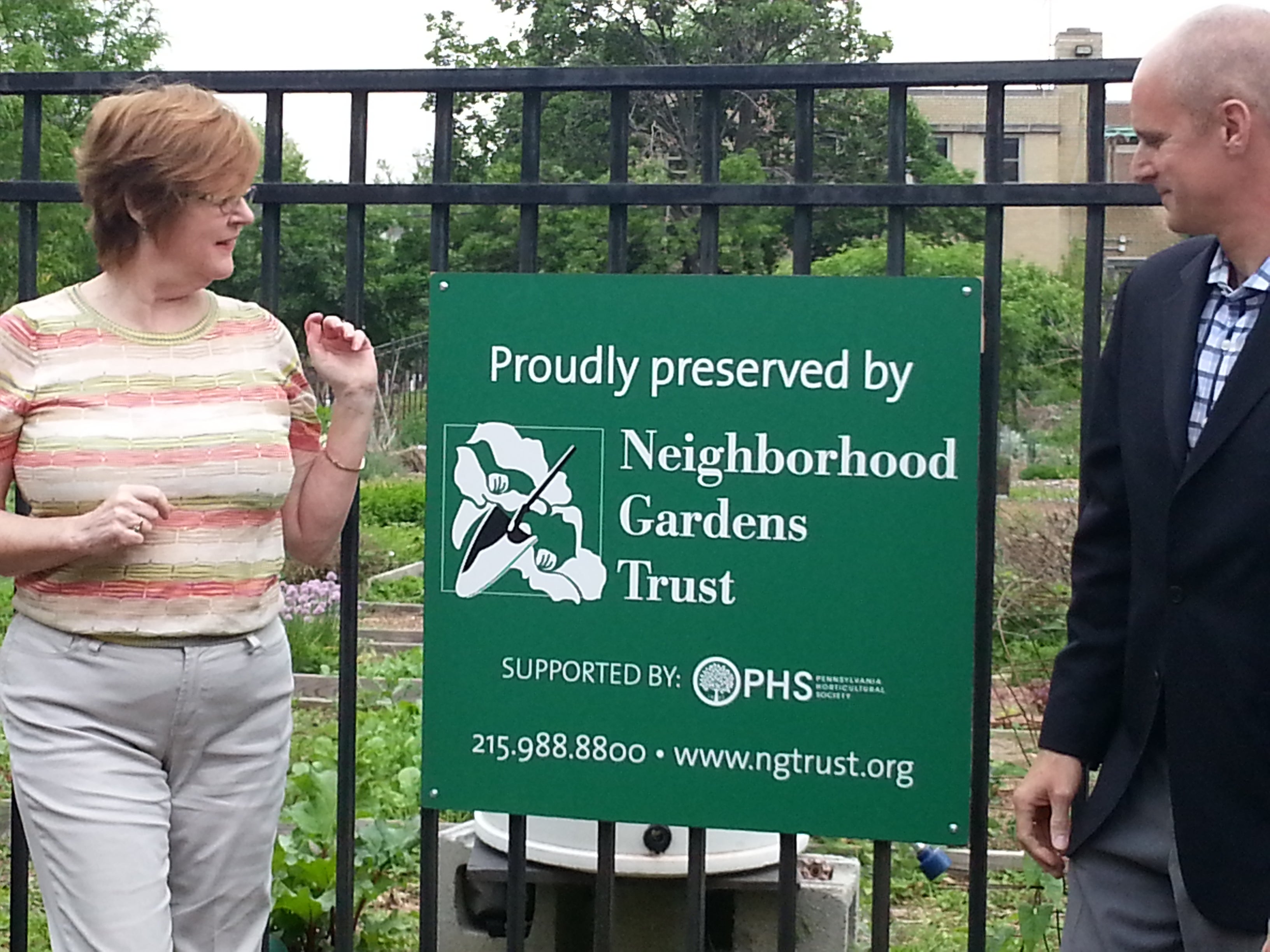 NGT Board President Margaret McCarvill and PHS President Drew Becher unveiling NGT's new logo. 