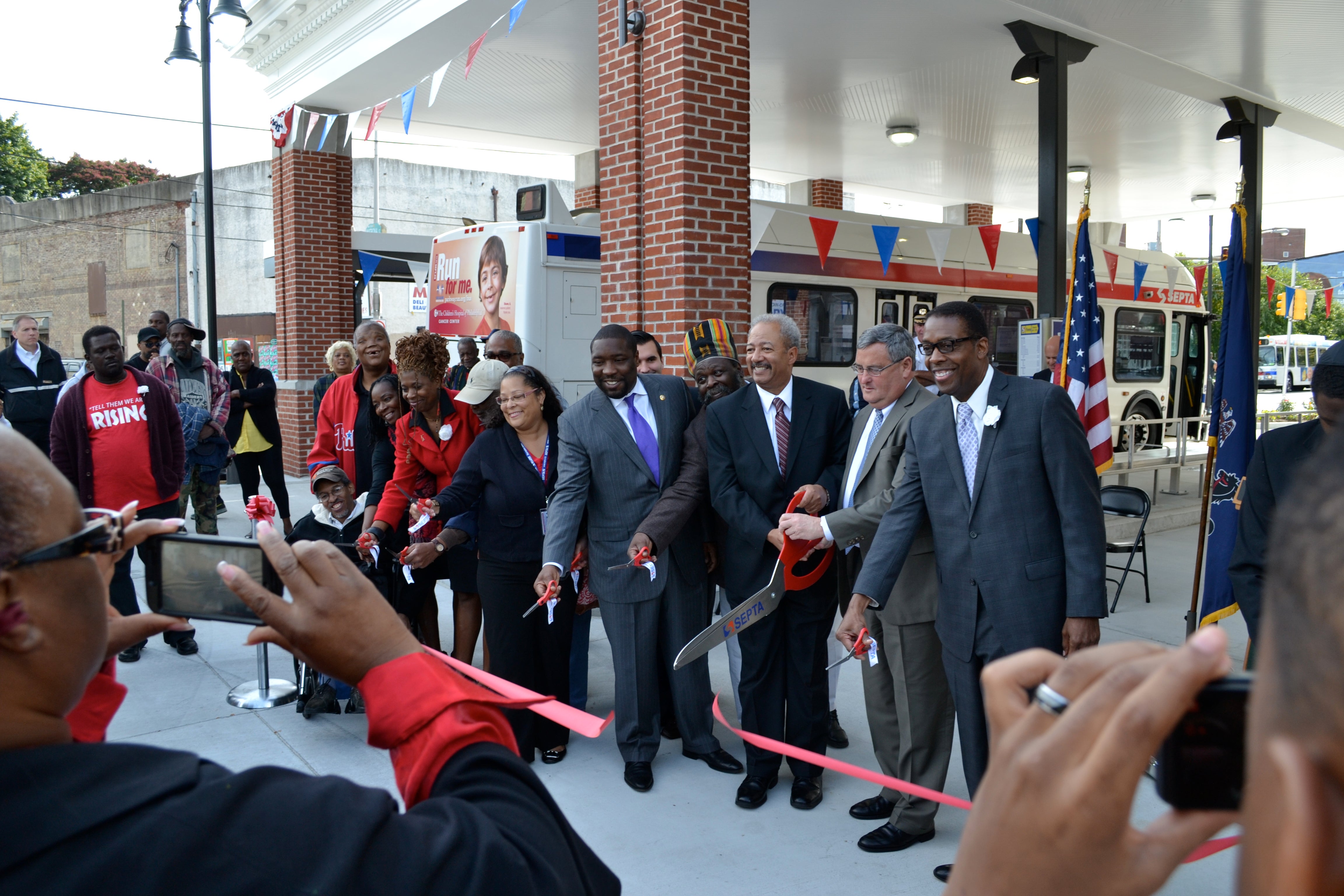 Project supporters posed for the official ribbon cutting