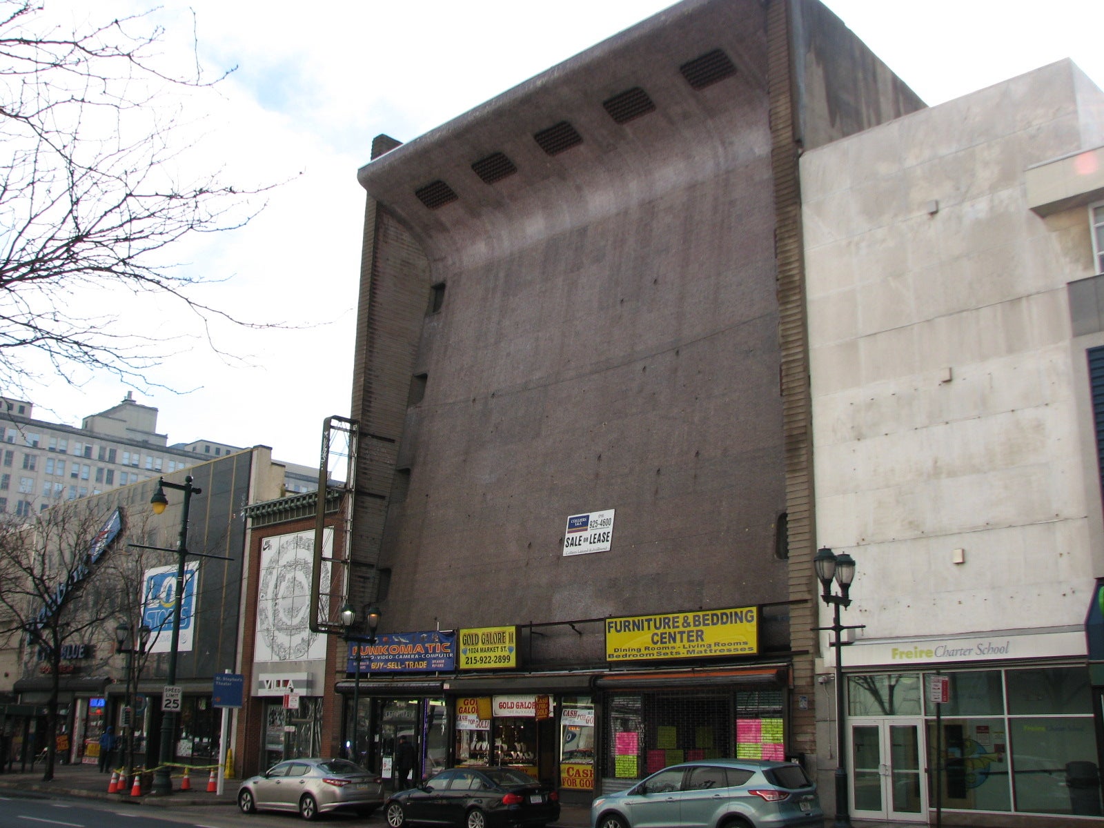 The former Robinson women’s clothing store at 1020 Market St. still looks like a wave rising and cresting over the commercial beachhead.