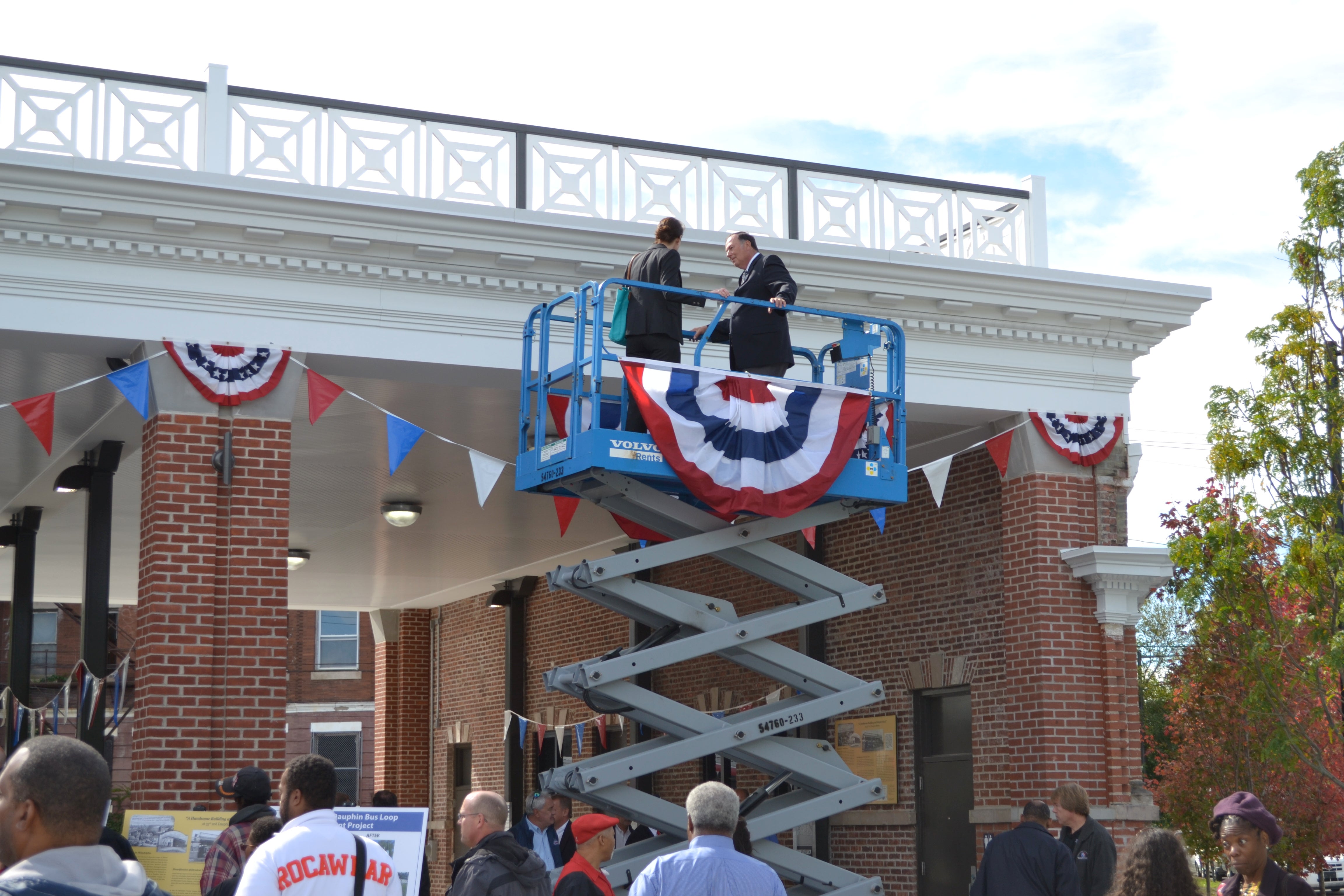 SEPTA hoisted people in a cherry picker to see the new green roof