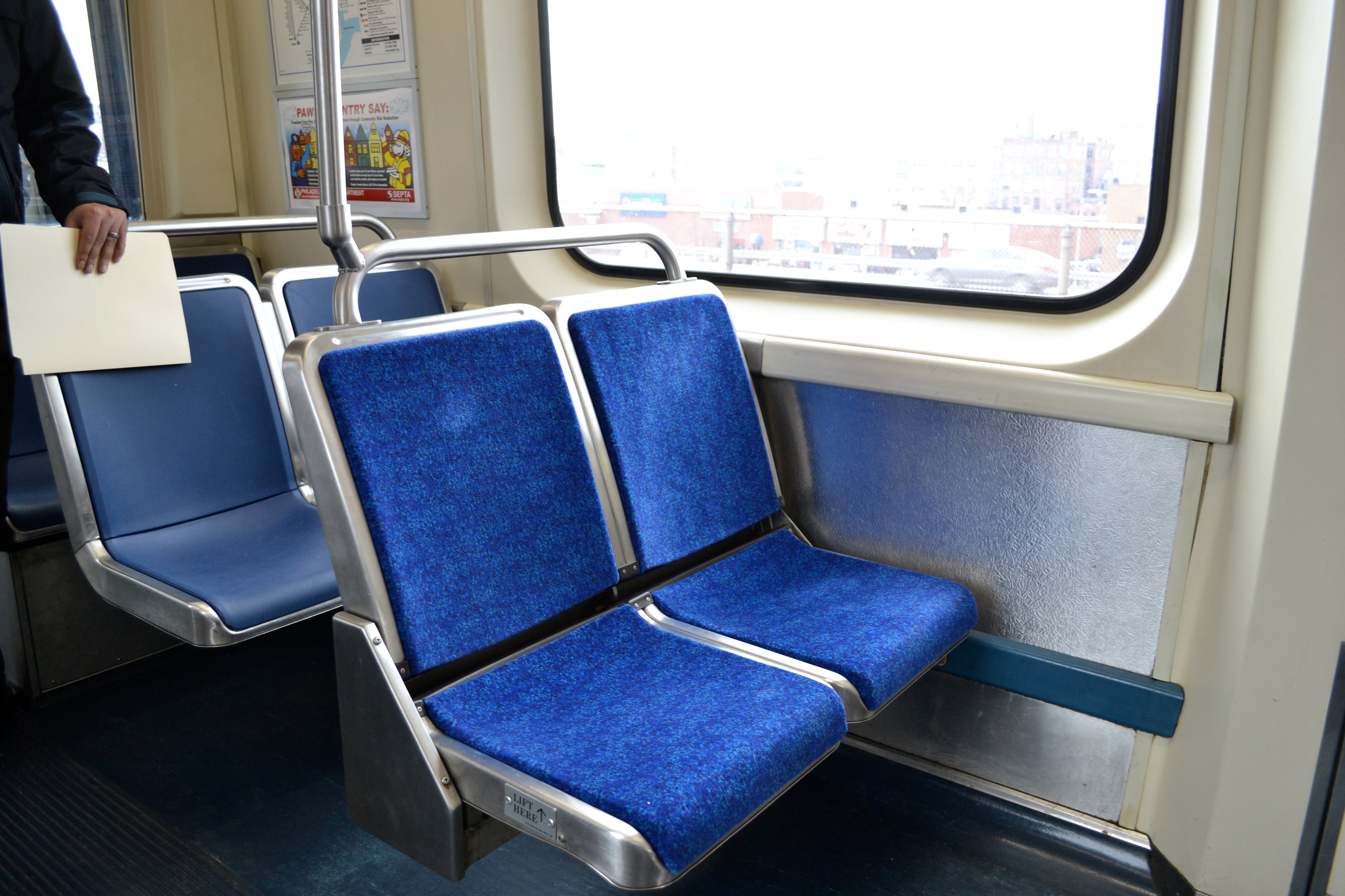 The current cloth seats next to the prototype fiberglass seats