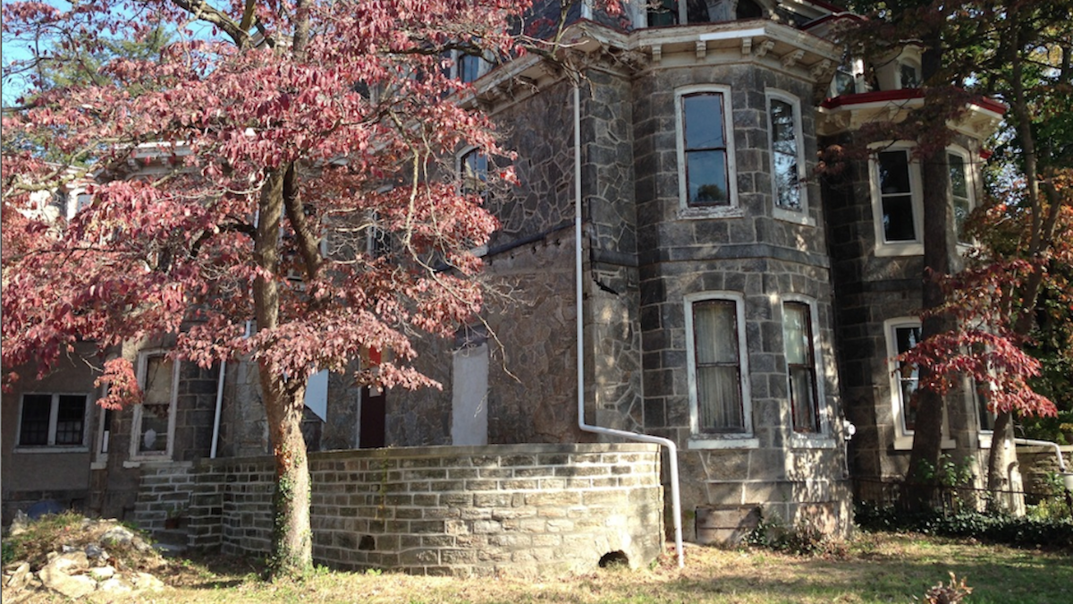 The source of ongoing neighborhood friction, the city just spruced 5357 Knox St. up for what it hopes is the last time. (Neema Roshania/WHYY)