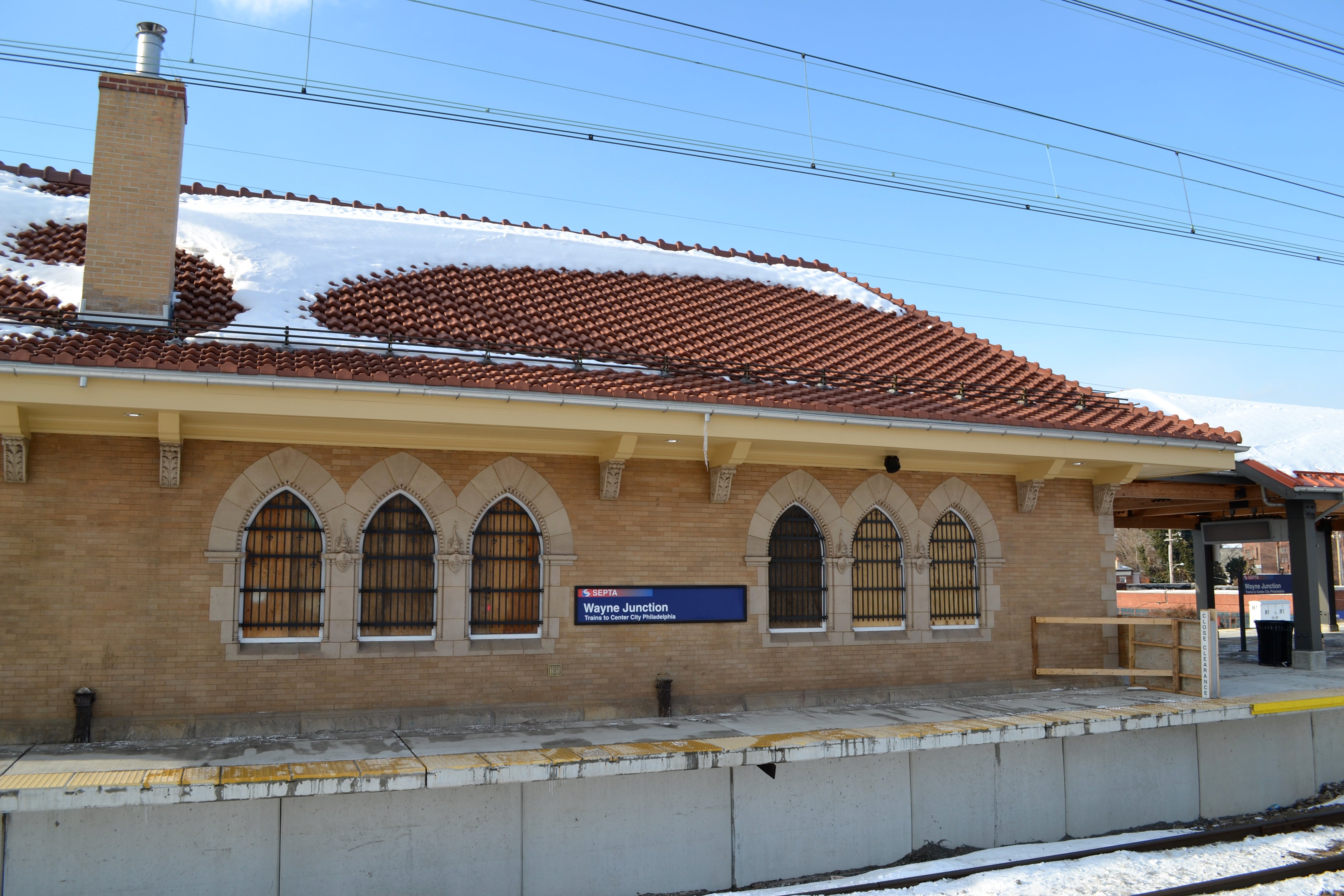 The station building is still under construction, but the roof work is complete