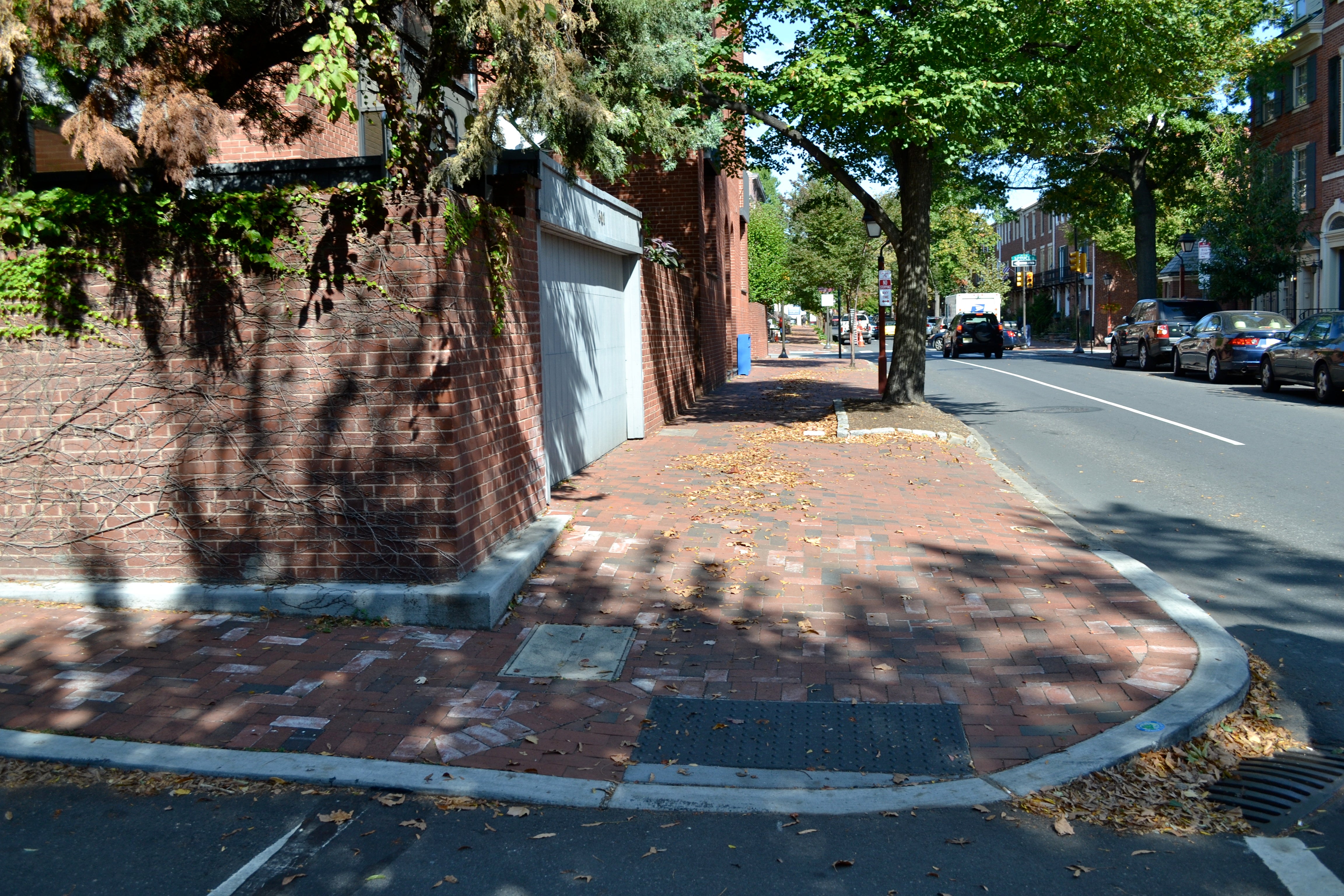 The Streets Department has to be careful not to disrupt home and garage entry ways by lowering the sidewalks to accommodate ramp slope requirements