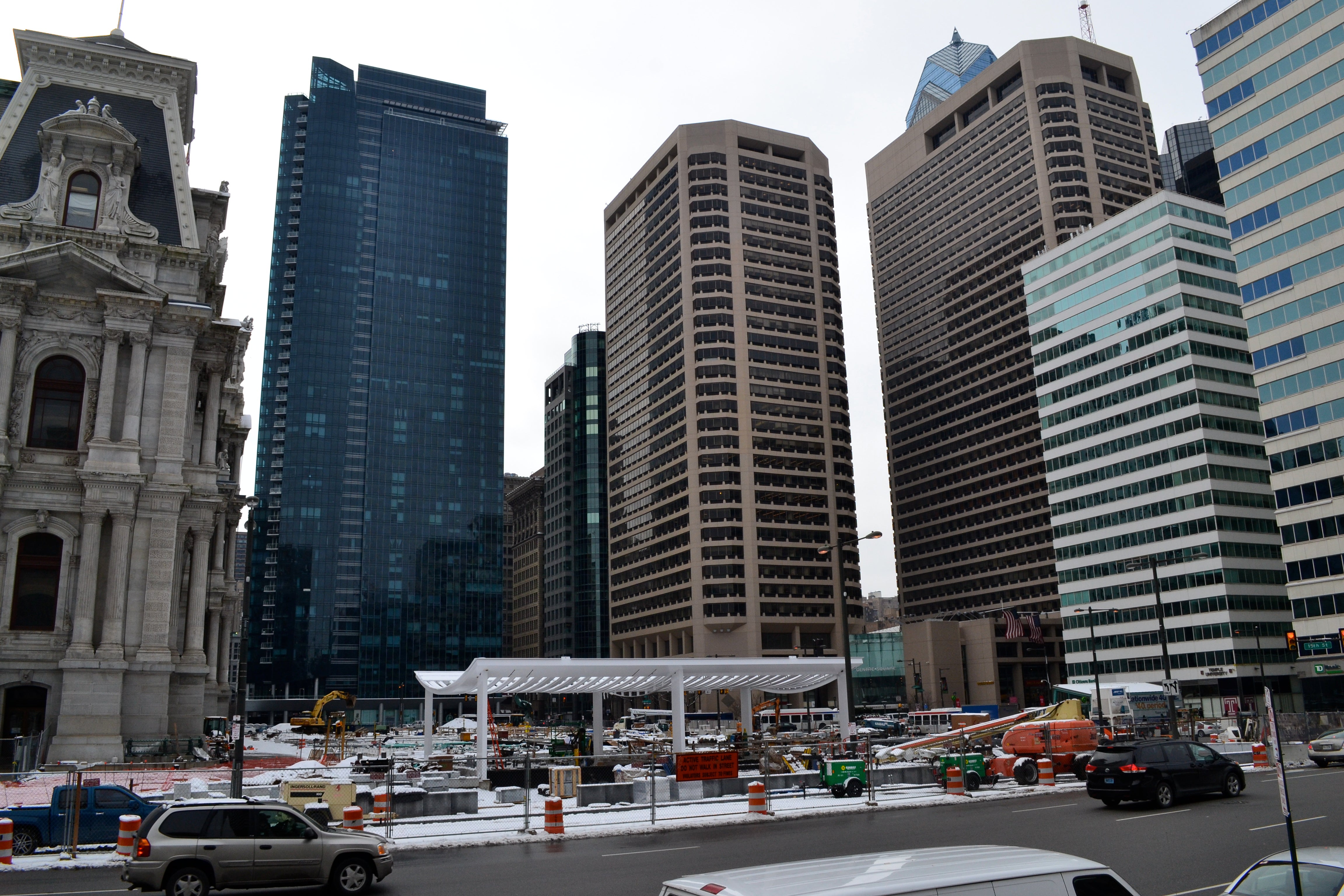 The structure is dwarfed by the surrounding skyscrapers