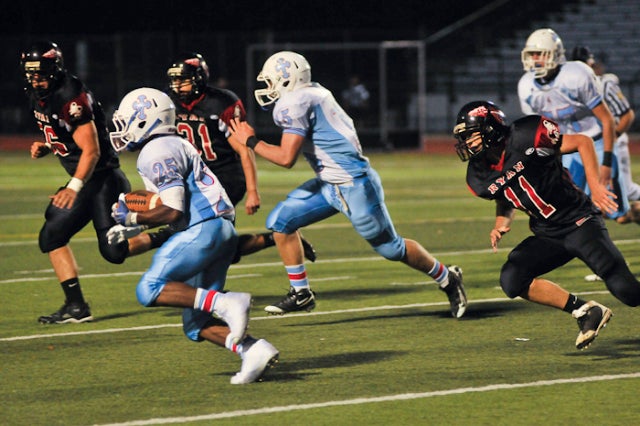 You always expect to see Crusaders' running back Curtis Wortham accumulate a few dozen yards per game; he didn't disappoint. Ryan defenders Tony Vendetti (11),  Anthony Victor (31) and Cavan 