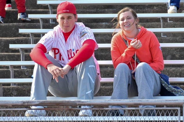 On the North Catholic side of the field, Sunday, the stands were full of red and white -- the school's colors. Shane Killion, a student at North, seen here with his girlfriend, Sophia Santiago, bo