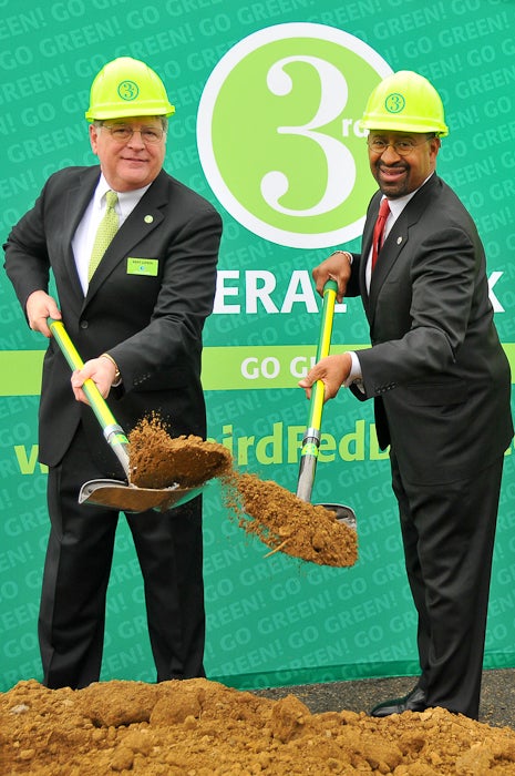 Kent Lufkin and Mayor Michael Nutter make the ceremonial dig.