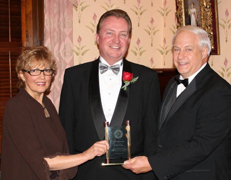 William P. St. Clair, center, of St. Clair CPA Solutions, accepts the 2009 Fellowship Award from the Greater Northeast Philadelphia Chamber Commerce at their 87th Annual Accolades Ball Dinner Dance Ga