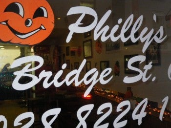 Philly's Phinest window, seen here decorated for Halloween.