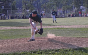 A Somerton Spartans player pitches a fastball during an NEPL game. Photo by Laura D'Alfonso.