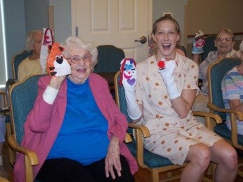 Residents from WEL's four locations made more than 200 sock puppets to be given to underprivileged children in Egypt. Photo courtesy of Wesley Enhanced Living.