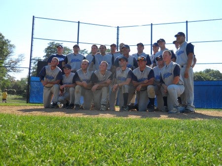 The Blue Sox in front of the pitchers mound at Ward Field after mounting a come-from-behind victory against the Cherry Hill Phillies for the NJIBL championship. Photo by Tom Rowan.