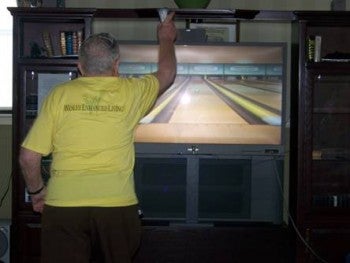 Wesley Enhanced Living Pennypack Park resident Gino Azzena competes in the second annual Wesley Enhanced Living Wii Bowling Tournament vs. Wesley Enhanced Living Upper Moreland. Photo courtesy of Wesl