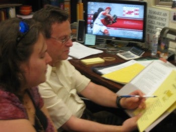 Joe Laub reviews notes with Choreographer Mary Therese Laub