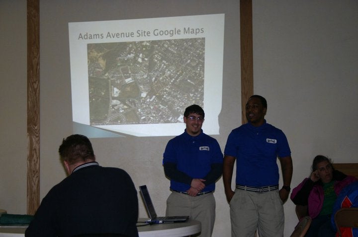 Bridge Program Director Michael Ogden facing students Andrew and Marquis